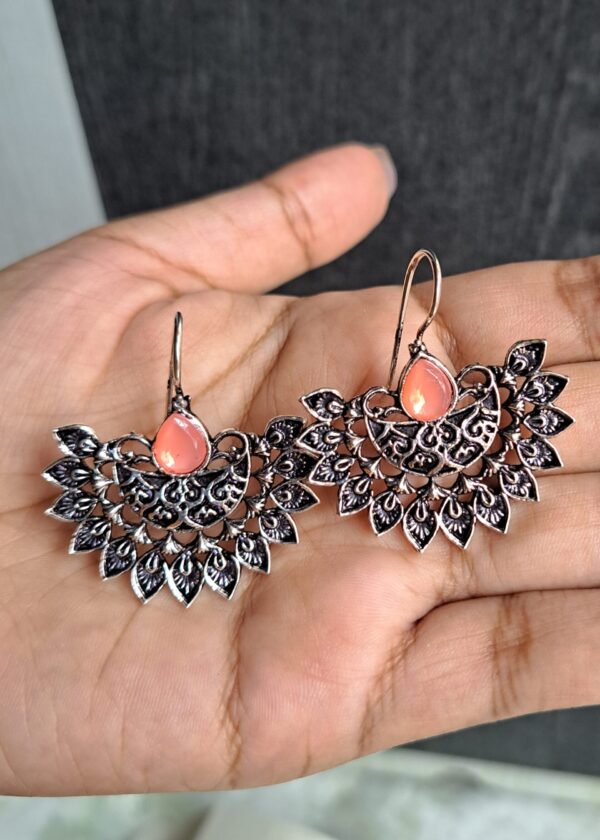 Pankhuri Pink Oxidised Earrings with floral-inspired metalwork and teardrop pink stone