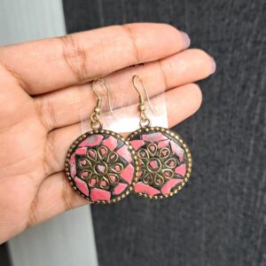 Vritika Pink Earrings with round design, pink mother-of-pearl, golden accents, and floral detailing.